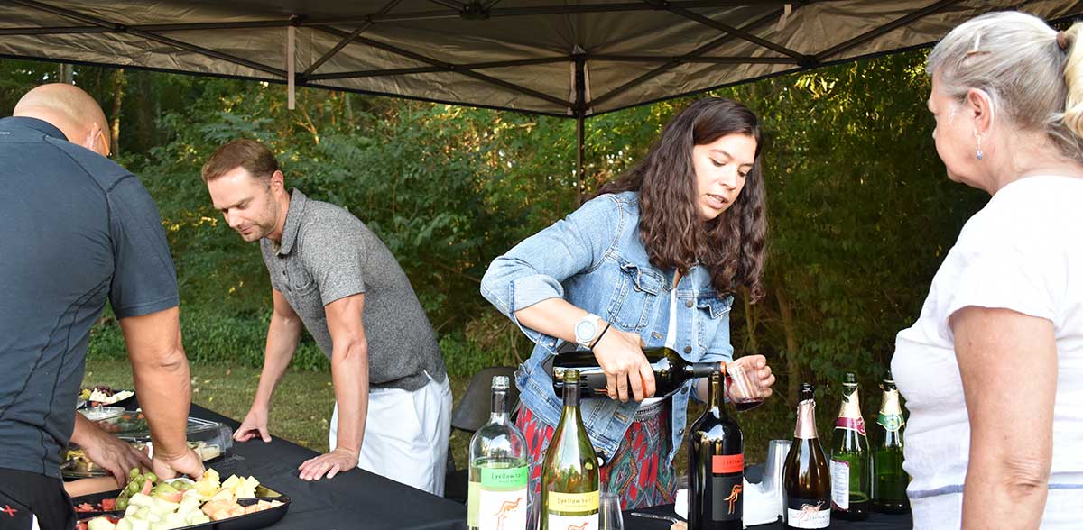 City of Tucker Park and Rec. employees serve food and wine at the 2019 Sip-n-Stroll.